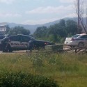 VIDEO: Standoff in patrol car ends after suspect shoots himself