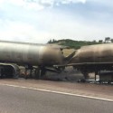 Tanker truck fire sparks grass fire, shuts down interstate