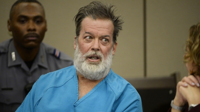 Robert Lewis Dear talks during a court appearance on Wednesday, Dec. 9, 2015, in Colorado Springs, Colo. Dear, accused of killing three people and wounding nine others at a Colorado Springs Planned Parenthood clinic on Nov. 27, was charged with first-degree murder. (Andy Cross/The Denver Post via AP, Pool)