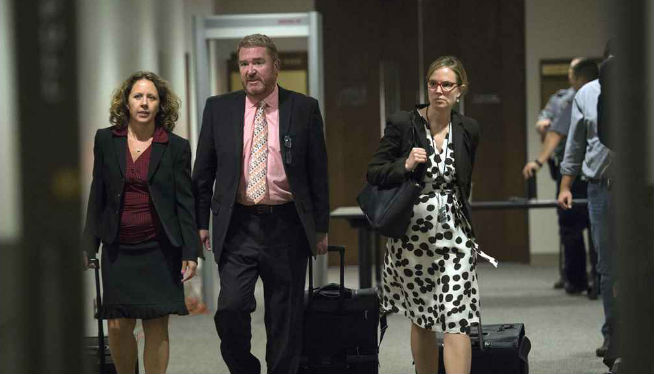 Public defenders Rosalie Roy, Dan King and Kristen Nelson. (Photo: Christian Murdock/The Gazette via AP, Pool)